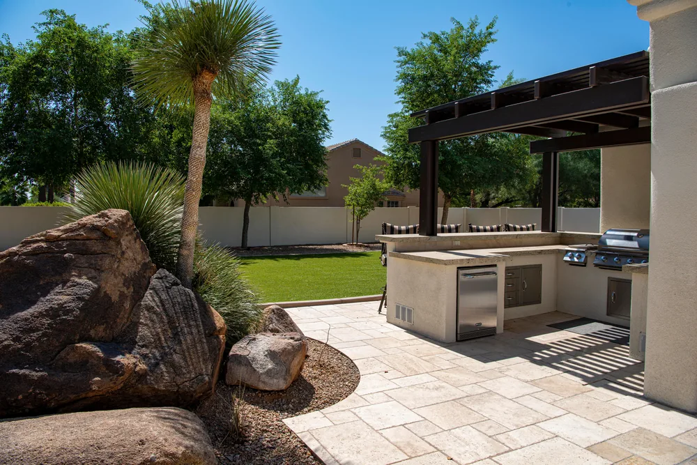 The finished outdoor kitchen and terrace