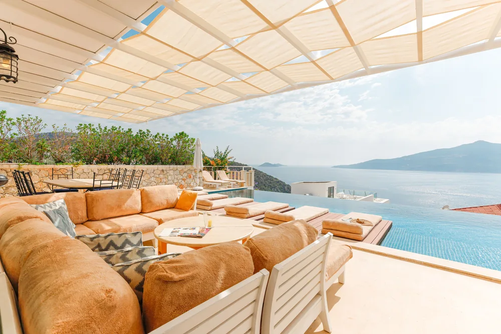An infinity pool terrace above a valley