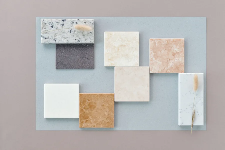 Stone and tile samples laid out for selection